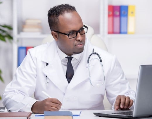 Doctor at laptop